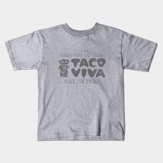 When you say "Taco" Kids T-Shirt by Mad Panda